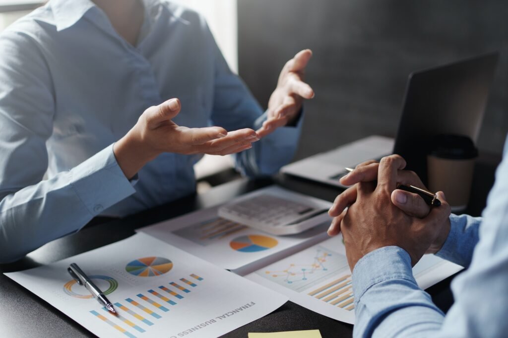 Business team jointly plan the investment at the meeting. Close-up of business people mentor pointin